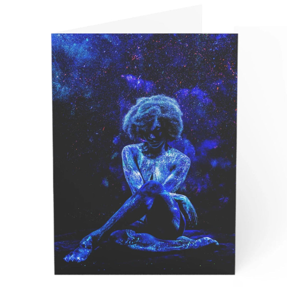 Mikael Owunna's Mgbakwocha (Grand Lady) Greeting card with a blue glowing figure against a starry night sky design.